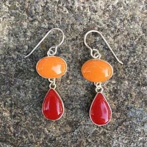 Hand-cut glass earrings.